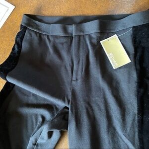 Michael Kors black slack with velvet tuxedo stripe and pocket embellishments.